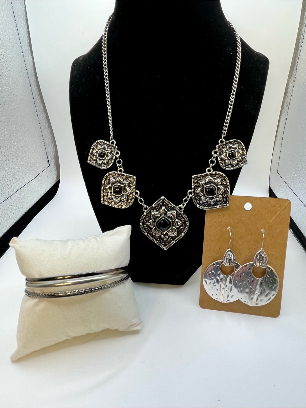 Silver-Tone Filigree Pendant Necklace. With coordinating earrings and bracelet
